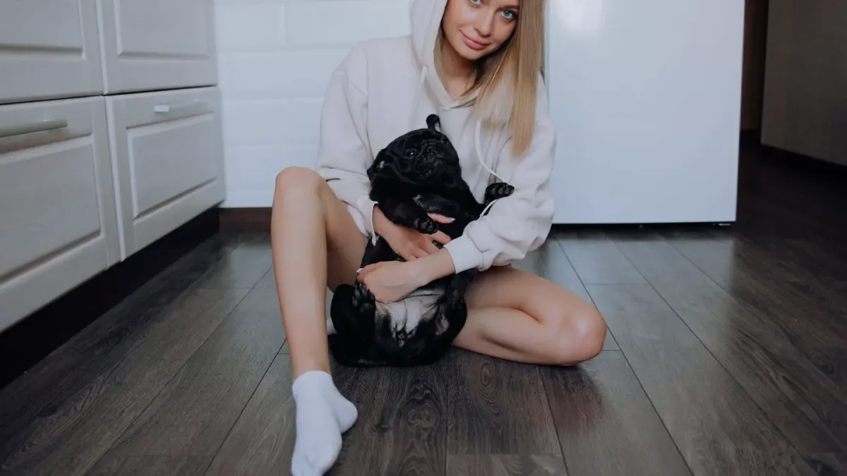 Dog owner preparing a meal
