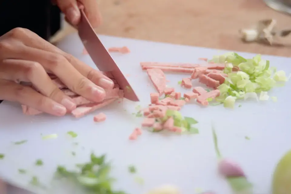 Dog owner preparing a meal