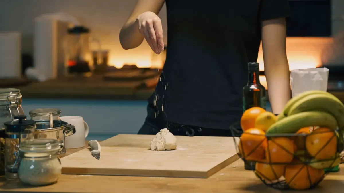 Dog owner preparing a meal