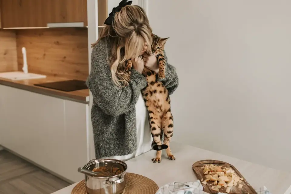 Dog owner preparing a meal